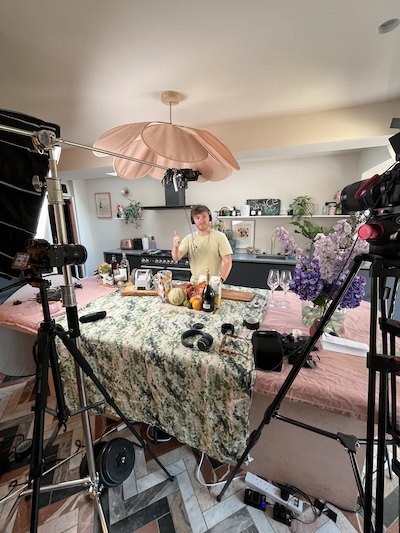 Lisa preparing to film with cameras on either side