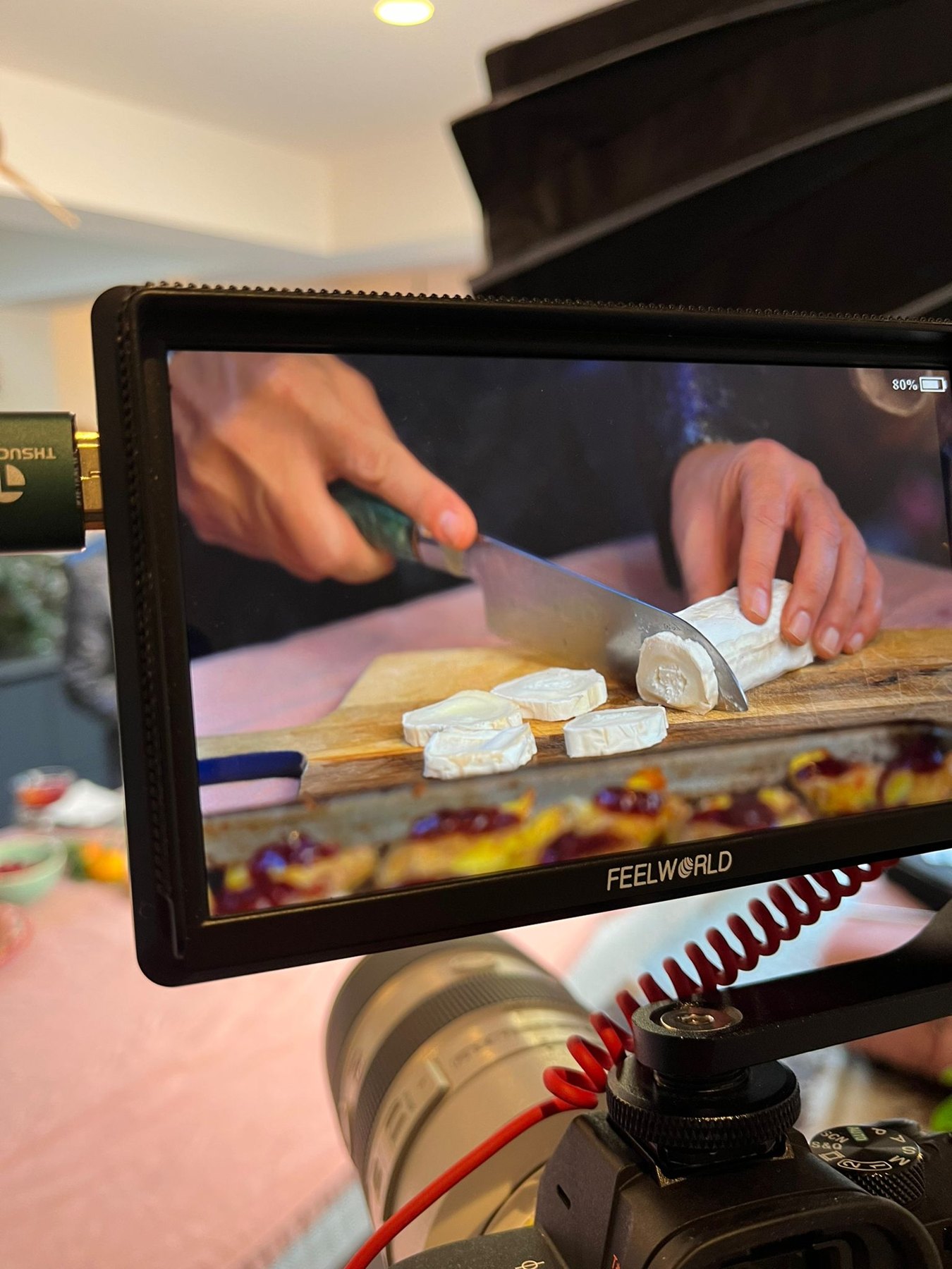 The camera monitor framing food preparation on the Mouthfull shoot